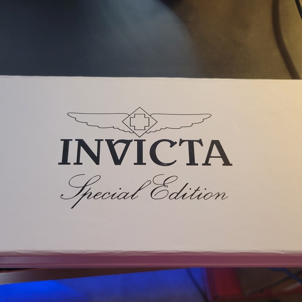 Woman's Invicta Watch  with additional bands